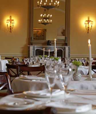 Candlelit restaurant in the Soane Dining Room at Hartwell House