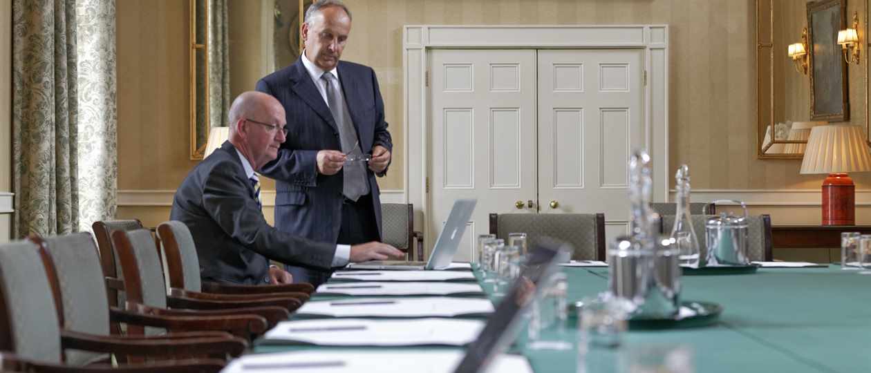 People meeting in James Gibbs room at Hartwell House