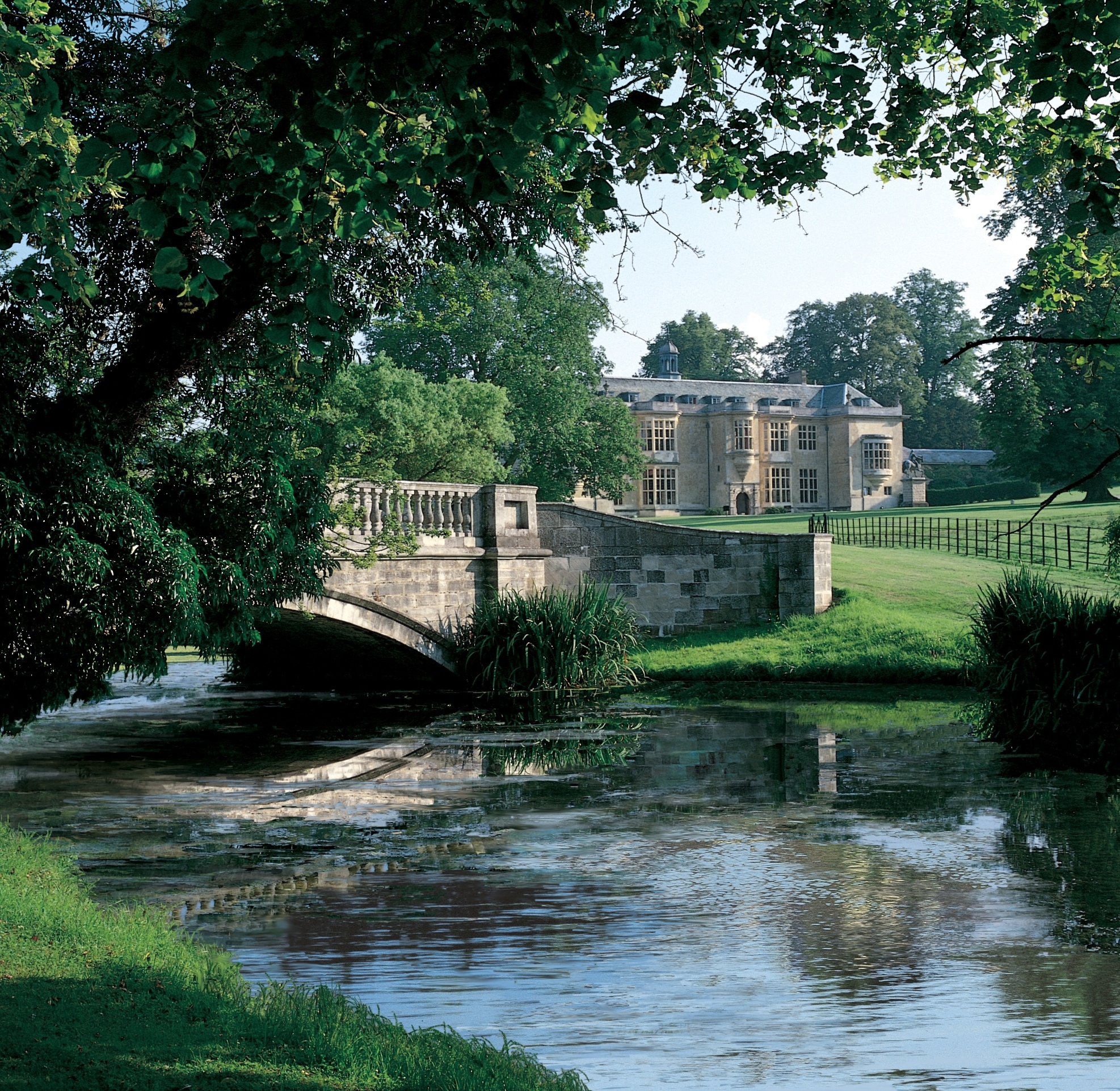 Hartwell House seen across the lake